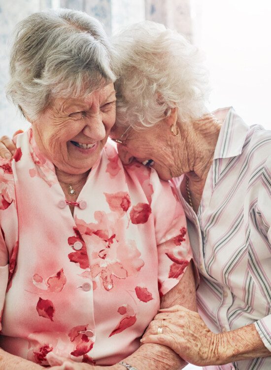 two women laughing